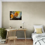 Bold and dark abstract landscape with orange, gold, blue and blackposter format displayed in a bedroom with wooden study desk