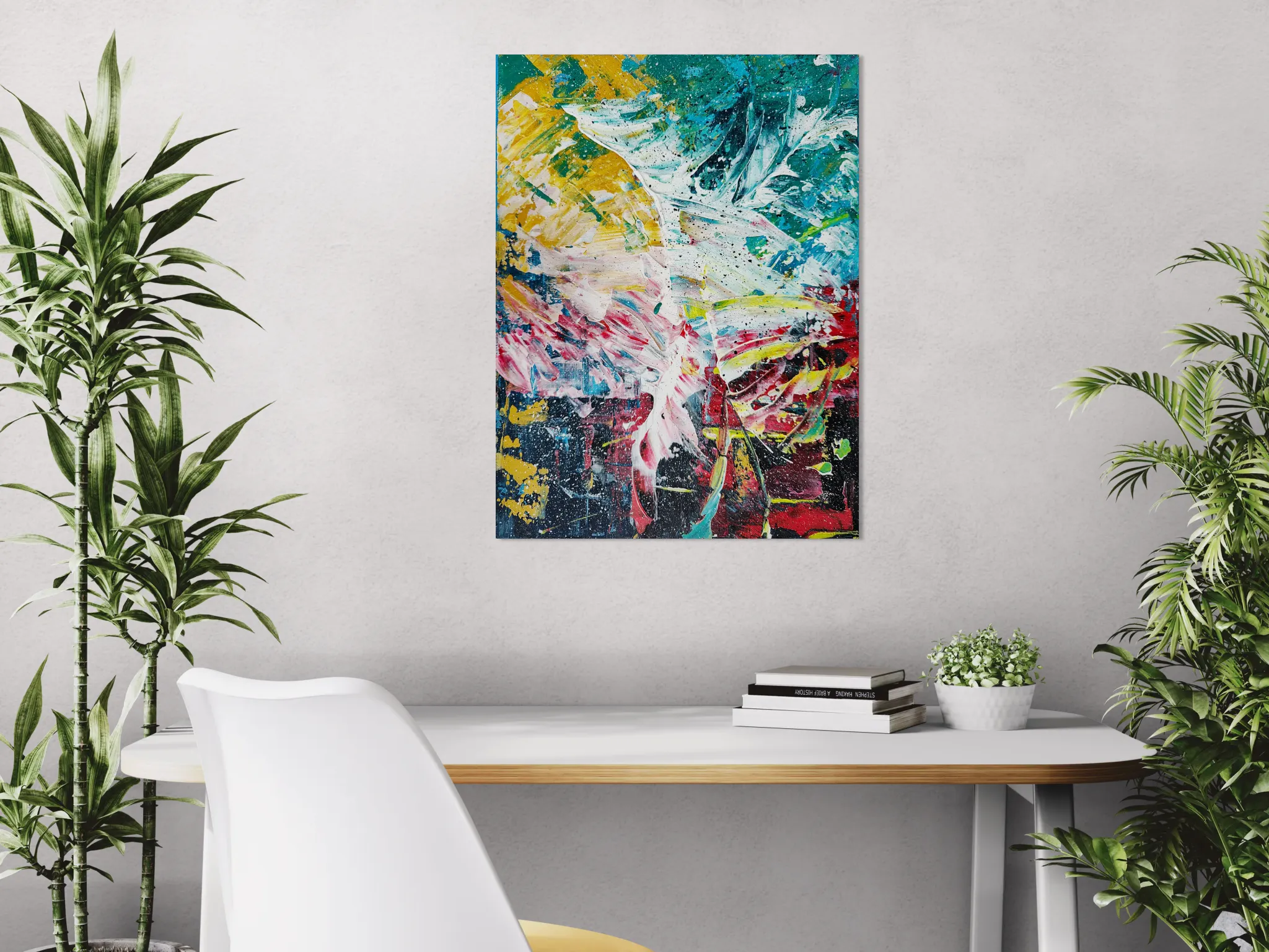 Joyful and colorful abstract portrait with yellow, aqua, red, blue, green, pinkposter format displayed in a white desk with decorative plants