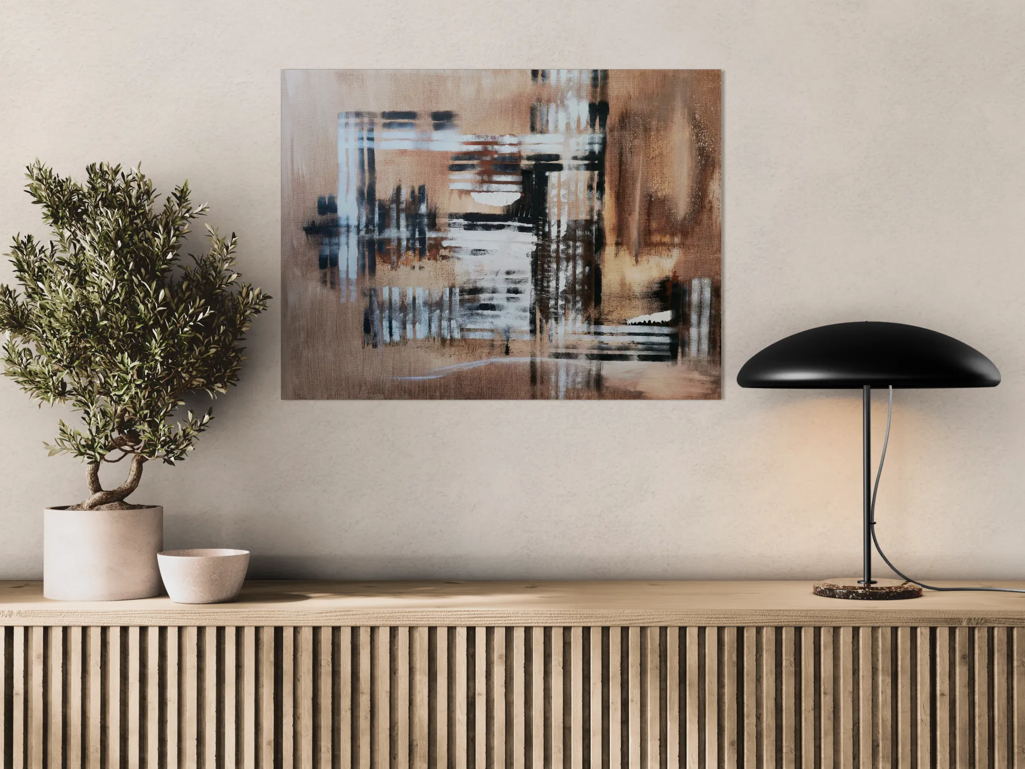 Warm and minimalistic abstract landscape in brown, white and blackposter format displayed in a light brown furniture with bonsai tree and light fixture