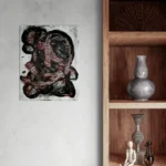 Dark and conceptual abstract portrait in white, black and redoriginal format displayed in a shelf with ornaments