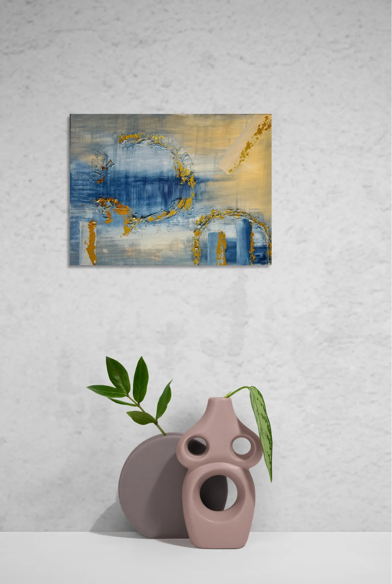 Dreamy glowing abstract landscape in blue and goldoriginal format displayed in a contemporary ceramic vase with white textured wall