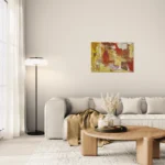 Warm conceptual abstract landscape with mustard yellow, red and brownoriginal format displayed in a comfortable living room with long sofa
