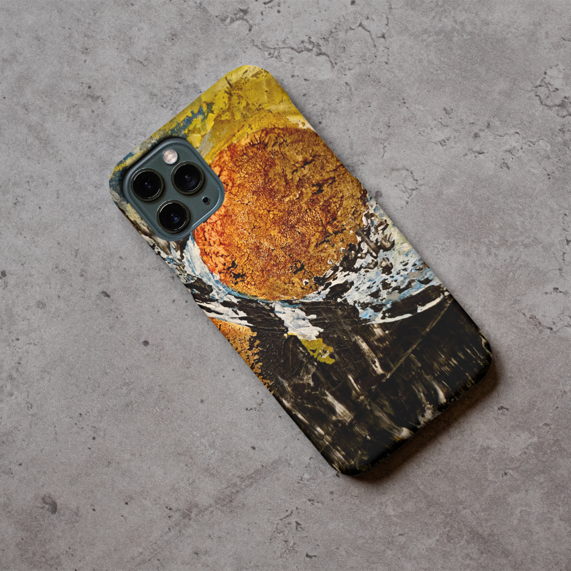 Phone case displayed on a grey concrete surface featuring the artwork “Antwerp”, a blue and black abstract piece.