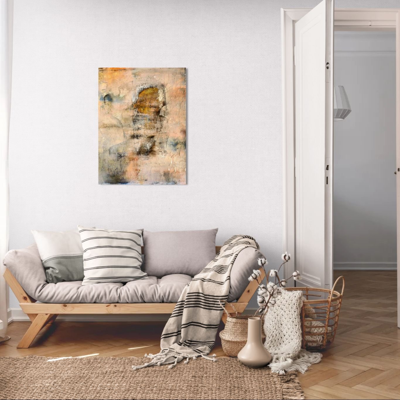 Abstract art poster with hidden face and warm layered colors in a cosy living room