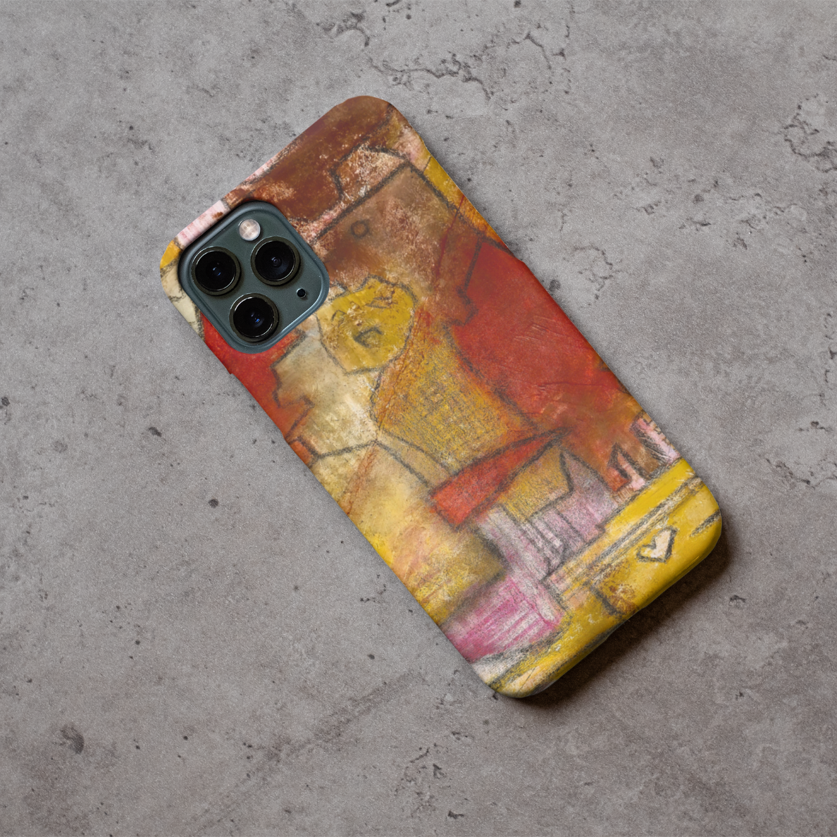 Phone case displayed on a grey concrete surface featuring the artwork “Cairo”, a yellow and red abstract piece with ancient figures.