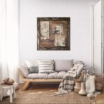 Hyperreal painting of a square old bulletin board with layered torn papers, rust stains, and a painted frame, all flat on canvas. Displayed in a cosy living room